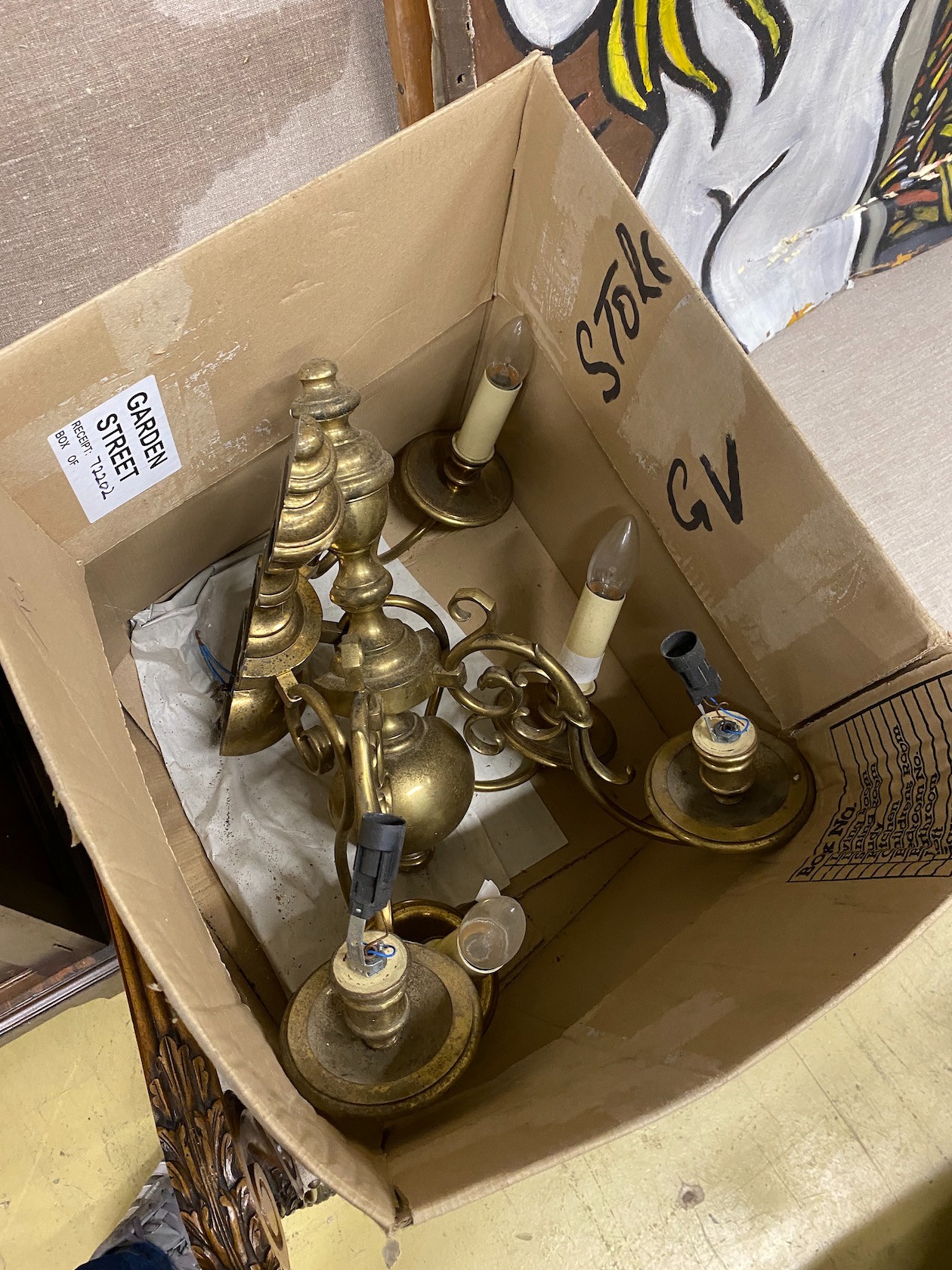 A Dutch style brass six branch electrolier, height 78cm and four similar wall lights